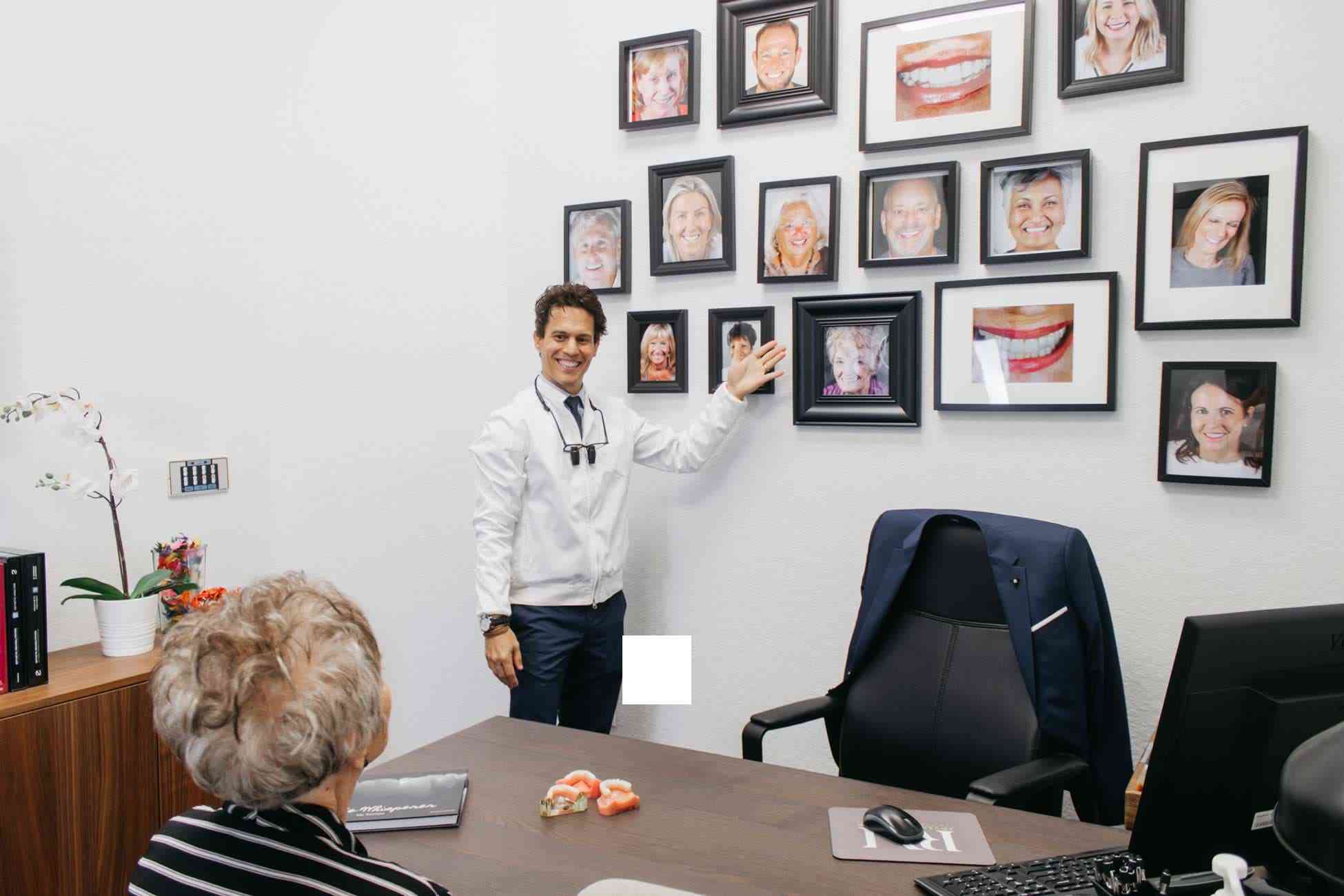Dr. Macedo presenting his wall of real patient smile results